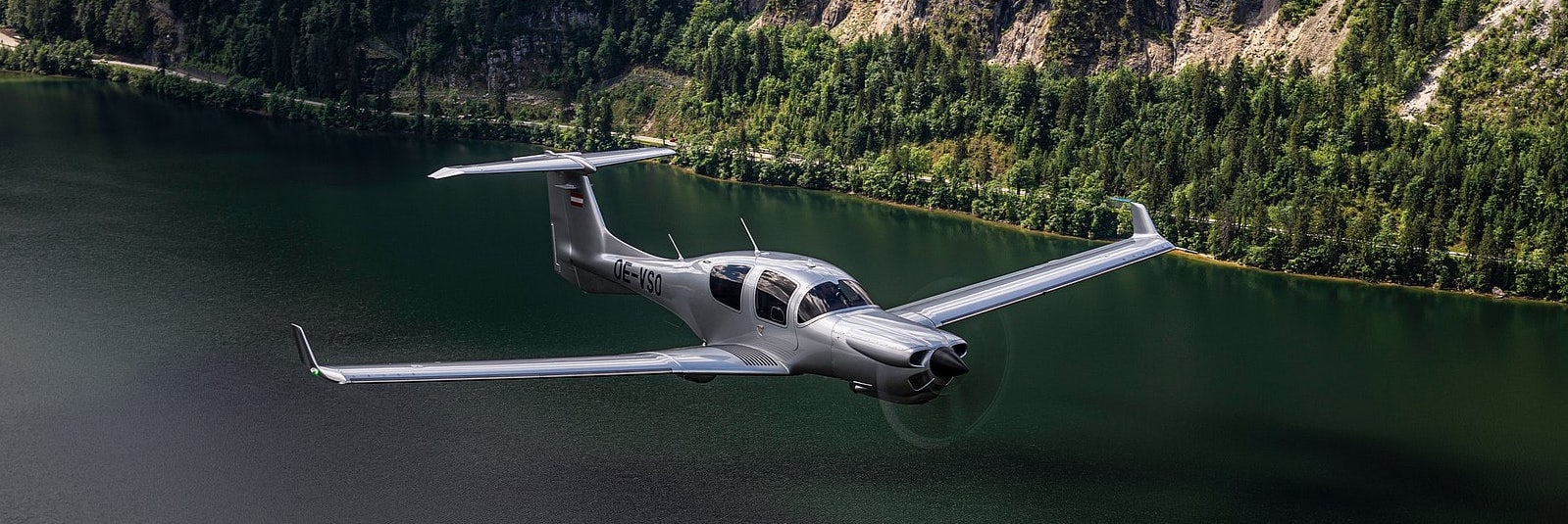 The DA50 RG flying over a lake
